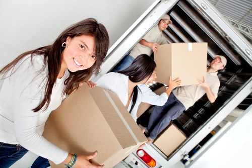 Moving day checklist and prepared boxes for a house removal