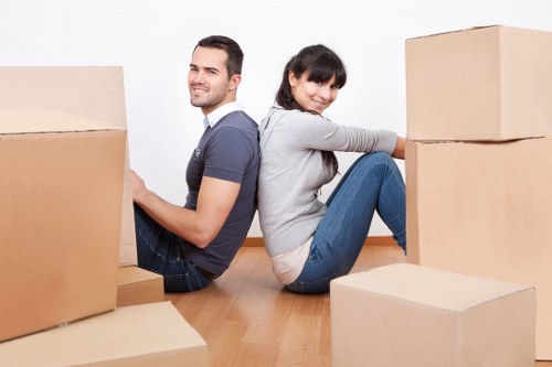 Careful packing of fragile household items for a local relocation